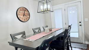 Dining area featuring a chandelier