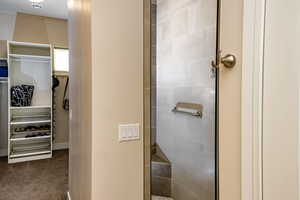 Owner's Bathroom with walk-in shower and walk-in closet