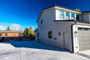 View of side of detached garage with apartment.