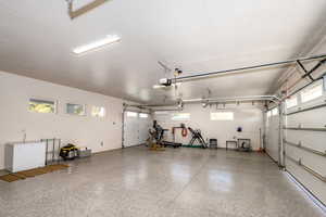 Garage with epoxy floors and garage door opener