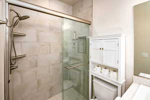 Bathroom 2 ensuite with an enclosed shower, vanity, and toilet