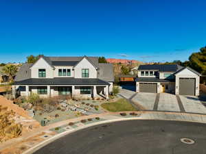 Modern inspired farmhouse with a mountain view and a garage