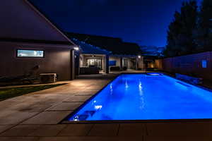 Pool at twilight and a patio