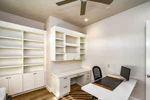 Office area with ceiling fan and light wood-type flooring