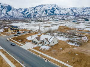Snowy aerial view with a mountain view