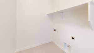 Laundry room with laundry area, baseboards, washer hookup, and electric dryer hookup