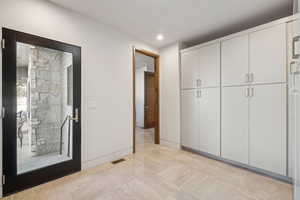 Unfurnished bedroom with recessed lighting and baseboards