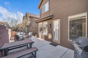 View of patio featuring an outdoor hangout area and grilling area