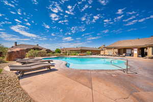 View of swimming pool featuring a patio area