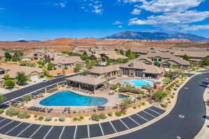 View of swimming pool with a mountain view