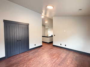 Unfurnished room featuring wood-type flooring