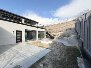 View of yard featuring a patio area and a mountain view