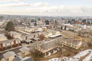 Snowy aerial view with a mountain view