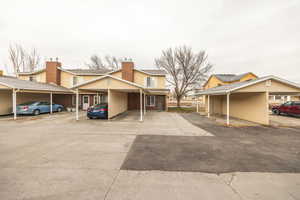 View of front facade featuring a carport