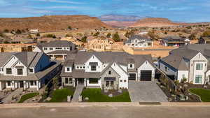 Birds eye view of property featuring a mountain view