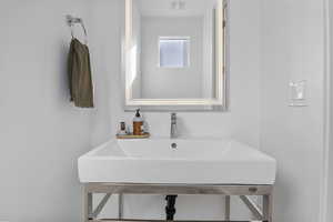 Half bathroom off of kitchen