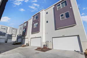 Back load 2 car garage, middle unit