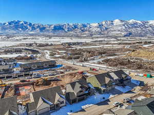 Snowy aerial view with a mountain view