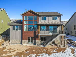 View of snow covered property