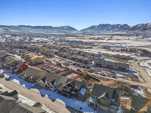 Snowy aerial view with a mountain view