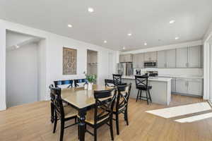 Dining space featuring light wood-type flooring