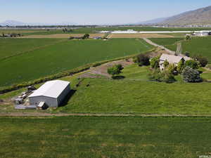 Drone / aerial view with a mountain view and a rural view