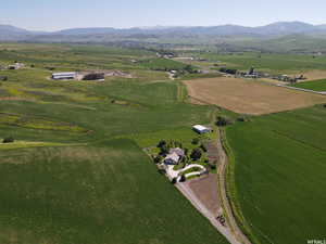 Birds eye view of property featuring a rural view and a mountain view