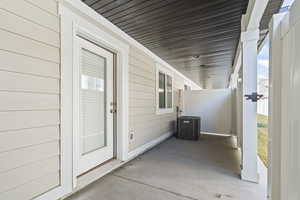 View of patio / terrace featuring cooling unit