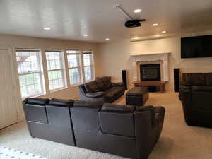 Living room featuring light colored carpet