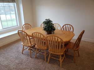 View of carpeted dining area