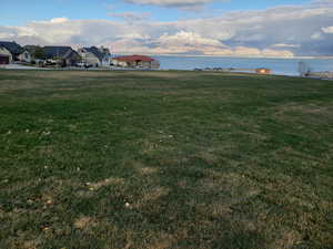 View of Marina Park across street from home with view of Utah Lake and Wasatch front mountains