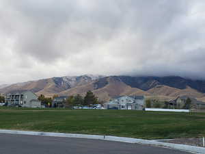 View of Home and forested mountains behind home