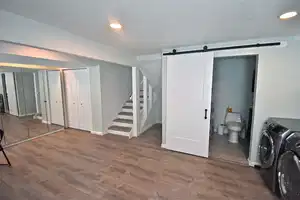 Basement Bedroom 4 (Master Suite) + Laundry