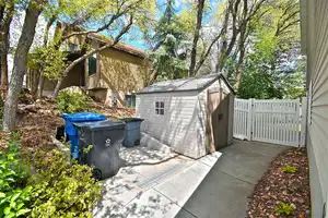 Exterior space with a storage shed