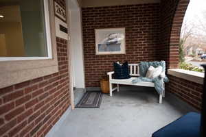 View of patio featuring covered porch