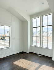 Unfurnished room featuring hardwood / wood-style flooring