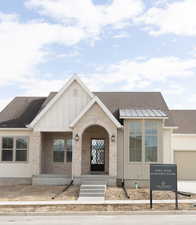 View of front of home with a garage