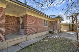 View of property exterior with a garage