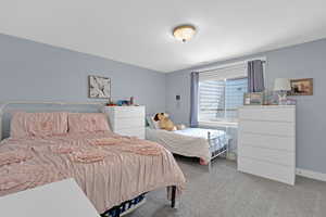 Bedroom featuring carpet floors