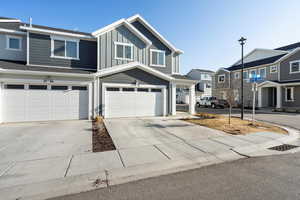 View of front of home featuring a garage