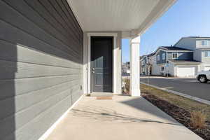 Entrance to property with a garage