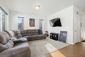 Living room with hardwood / wood-style floors