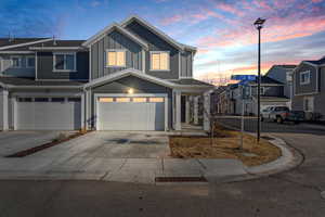 View of front of home featuring a garage