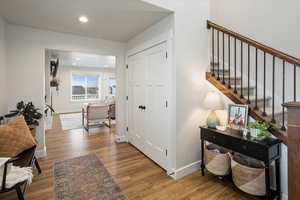 Foyer featuring wood-type flooring