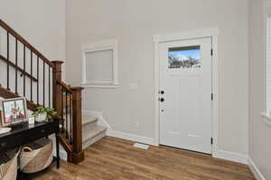 Foyer featuring hardwood / wood-style flooring