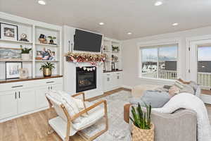 Living room with light wood-type flooring