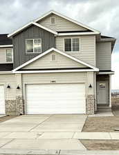 View of front of house with a garage