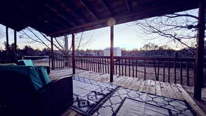 Deck at dusk with a shed