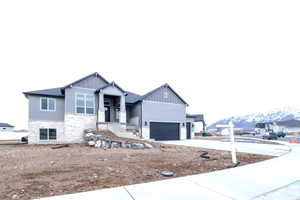 View of front of property featuring a mountain view