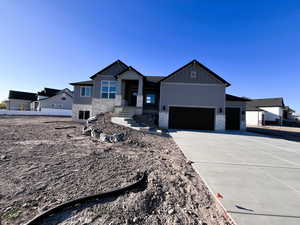 View of front of home with a garage